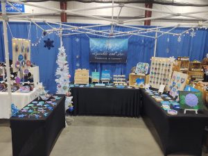 Sparkle and Ice booth at the 2023 Vermont Gatherings Holiday Market, inside the Champlain Valley Expo South building.