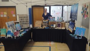 Sparkle and Ice booth at the 2024 U-32 Spring Craft Fair, in the gym at U-32 Middle and High School.